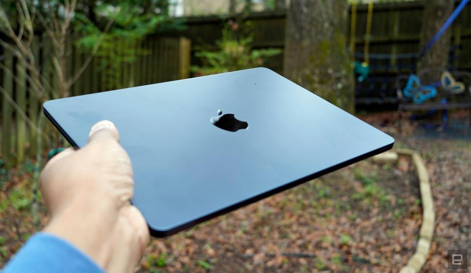 Holding the MacBook Air M3 13-inch 
