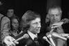 FILE - Movie director Roman Polanski talks with reporters outside the courtroom where he was arraigned on March 30, 1977, in Los Angeles, on rape and sex perversion charges. The case involving Polanski, who fled the United States after he forced himself on a 13-year-old girl during a photo shoot, has spanned 45 years. On Sunday, July 17, 2022, The Associated Press obtained an unsealed court transcript of the former prosecutor in the case testifying that the judge privately told lawyers he would renege on a promise and imprison the renowned director. (AP Photo/File)