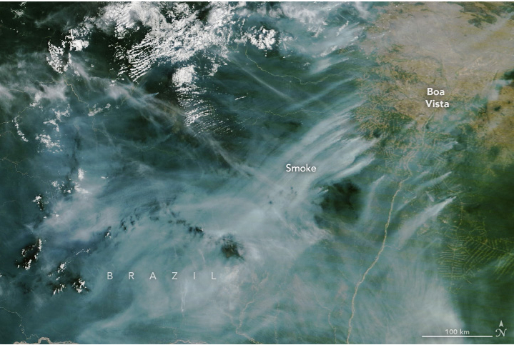 Satellite image of gusts of smoke blowing over a Brazilian state.