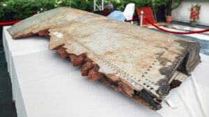 A piece of debris thought to belong to MH370 on display in 2019.